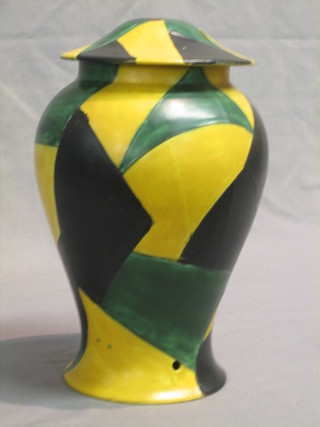 An Art Deco Harlequin pattern pottery lamp base 11"