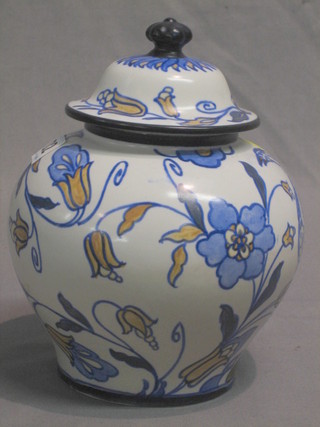 A faience urn and cover, the base impressed Wardle and marked Indus 7"