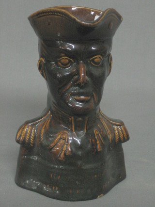 A 19th Century treacle glazed Toby jug in the form of an Army Officer 7" (slight chip to base)