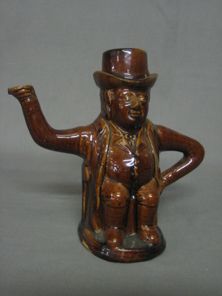 A 19th Century salt glazed teapot in the form of a seated gentleman 10" (lid f and r)