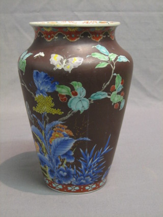 An Eastern brown glazed vase with floral decoration 10"