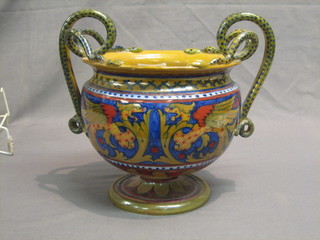 A Majolica style twin handled urn, the base marked Italy SCU  with serpent handles 7"
