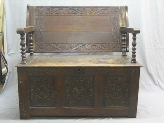 An 18th/19th Century carved oak monks bench 47"