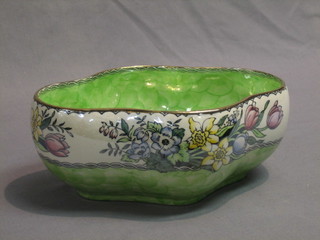 A green glazed Malingware bowl 9"