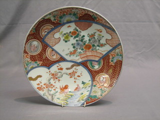 A Japanese Imari porcelain plate with panel decoration 12"