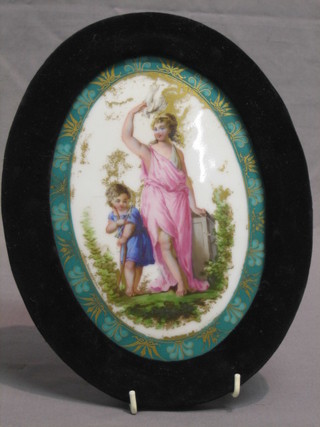 An oval porcelain plaque depicting classical figures  8 1/2" oval