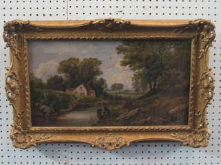 A 19th Century oil on canvas "Figure by a River and Cottage" 10" x 18"
