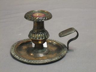 A 19th Century silver plated chamber stick