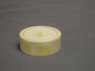 A 19th Century circular carved ivory box 3 1/2" (some cracks)