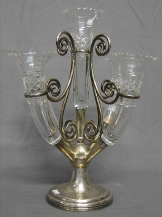 A silver plated epergne with 5 cut glass vases (1f), raised on a circular spreading foot