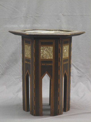 A 19th/20th Century Eastern octagonal shaped occasional table  with inlaid mother of pearl decoration 16" (some missing)