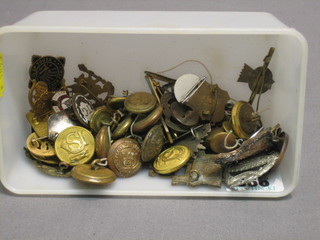 A George V Life Guards cap badge, a Royal Tank Regt. cap badge, a George V Royal Engineers cap badge and a collection of buttons and other badges