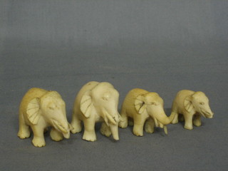 4 small carved Eastern ivory figures of elephants