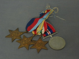 A group of 4 medals 1939-45 Star, Africa Star, Italy Star and British War medal