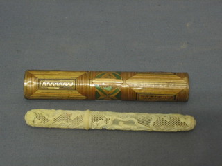 A pierced ivory needle case contained in a straw work case 5"