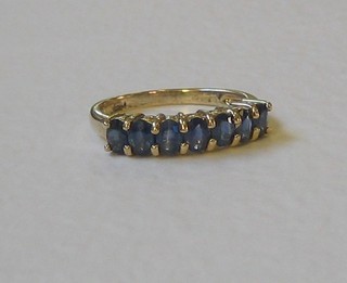 A lady's 9ct gold dress ring set sapphires