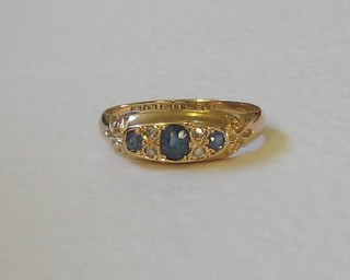A lady's Victorian 18ct gold dress ring set sapphires and diamonds