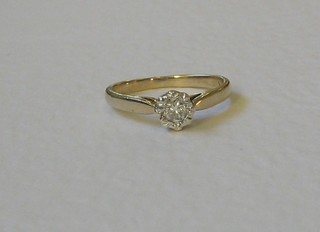 A gold dress ring set a small diamond