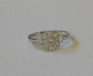 A lady's 18ct white  gold Art Deco style dress ring set diamonds (approx 0.48ct)