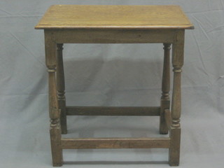 An 18th/19th Century rectangular oak occasional table, raised on turned and block supports 24"
