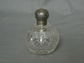 An Edwardian cut glass globular shaped scent bottle with silver lid, 4" (marks rubbed)