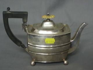 An Edwardian square Georgian style Bachelor's teapot, raised on 4 bun feet, marks rubbed (handle f) 11 ozs