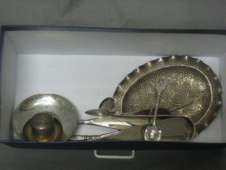 An Eastern oval white metal dish, 2 silver handled shoe horns, a silver ashtray and etc