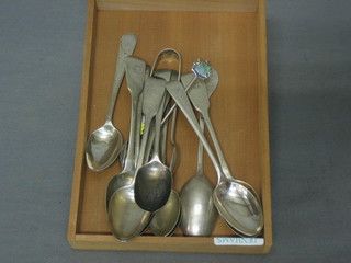 A pair of silver sugar tongs and 12 various teaspoons 6 ozs