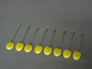 A set of 8 Art Deco silver and yellow enamel backed coffee spoons, Birmingham 1935 with Jubilee hallmark