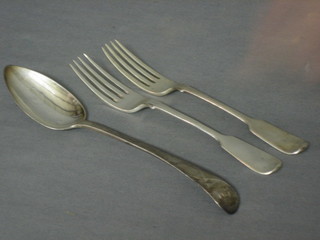 A Georgian silver Old English pattern table spoon with buttercup decoration, together with a pair of Victorian silver fiddle pattern forks 4 ozs