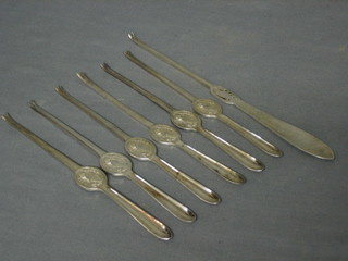 A Victorian silver oyster pick, London 1870 together with 6 plated oyster picks