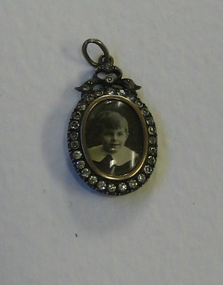 A Victorian silver and gilt metal photo locket set brilliants