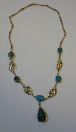 A gold and turquoise necklet