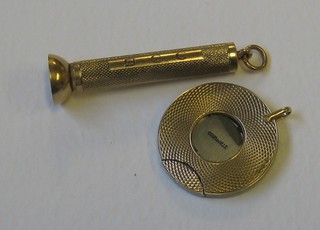 A 9ct gold cigar drill together with a 9ct gold cigar cutter