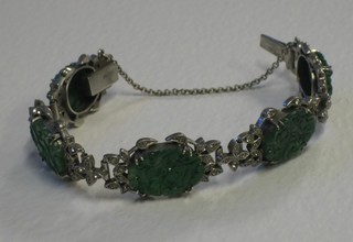 A silver and "jade" set bracelet