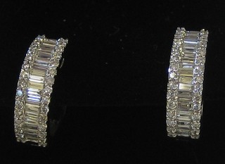 A pair of lady's 18ct white gold hoop earrings set baguette cut diamonds (approx 0.90ct)
