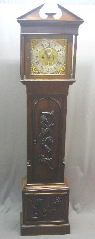 An 18th Century 8 day longcase clock, the 12" square brass dial with gilt metal spandrels, silver chapter ring, minute indicator, calendar aperture and circular winding holes by S Stephen Levit of Chelmsford, with a 5 pillar movement, striking on a bell and contained in a carved oak and mahogany case 86"