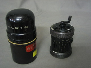 A Curta Type II calculator, the base marked 508930