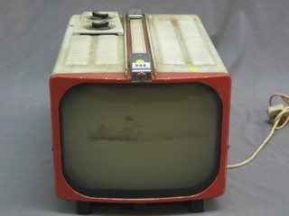 An early Pye portable television contained in a metal case, the reverse marked TV Receiver Type PTV