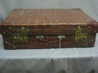 A crocodile suitcase 22" (handle f)