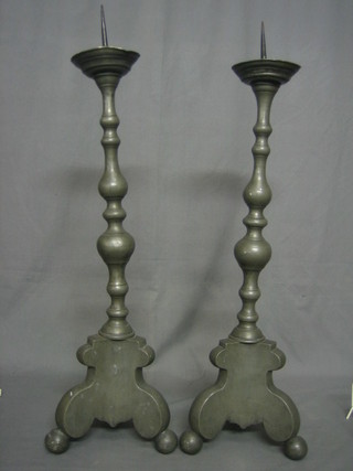 A pair of 17th Century style pewter candlesticks 25"