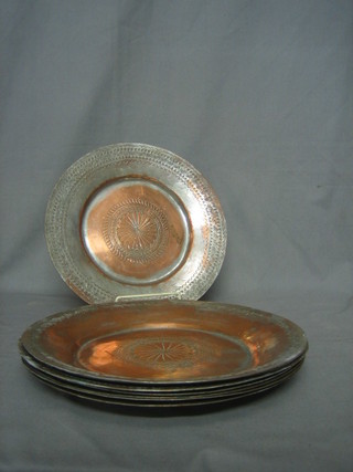 7 19th Century Eastern circular copper plates 11", bases with signature mark