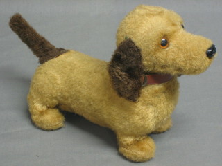A Lincoln International battery operated model of a dog