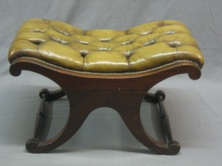 A Georgian style mahogany X framed stool upholstered in leather