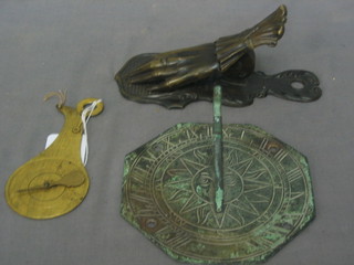 A metal balance by Parmell of London together with a verdigris table sundial 4" and a gilt metal paper clip in the form of a clasped hand 6"
