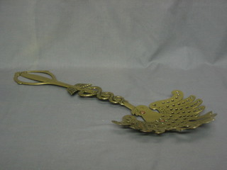 A handsome 19th Century brass cream skimmer decorated 2 serpents and an eagle (old repair)