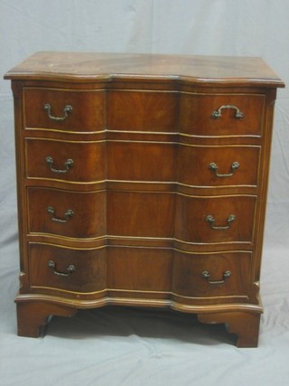 A Queen Anne style figured walnut serpentine fronted chest of 4 drawers, raised on bracket feet 28"