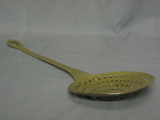 A 19th Century brass cream skimmer