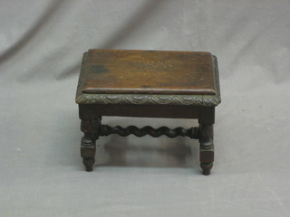 A Victorian rectangular carved oak stool with H framed stretcher 11"