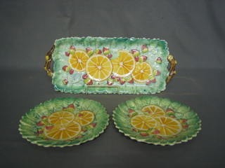 A Spanish pottery sandwich set comprising sandwich tray and 6 sandwich plates, decorated oranges